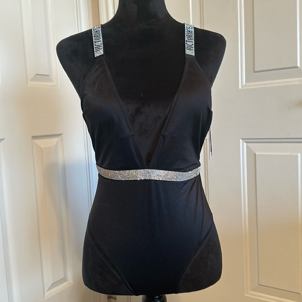 Beautiful black one piece bathing suit with some bling open back